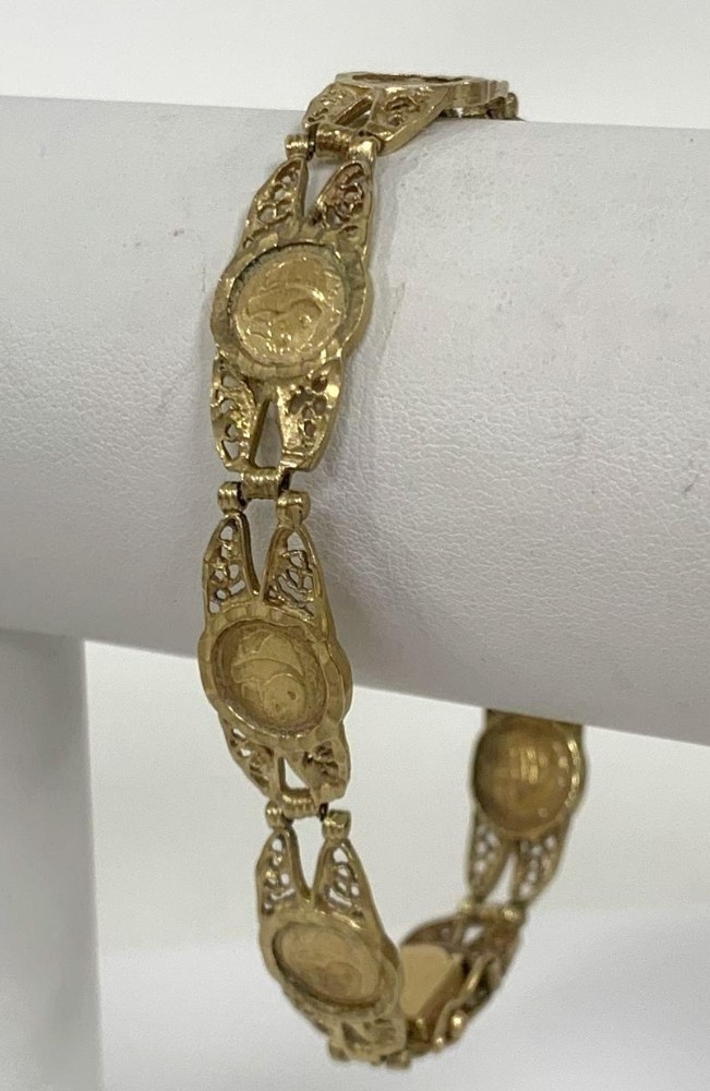14k gold link bracelet with round accent charms